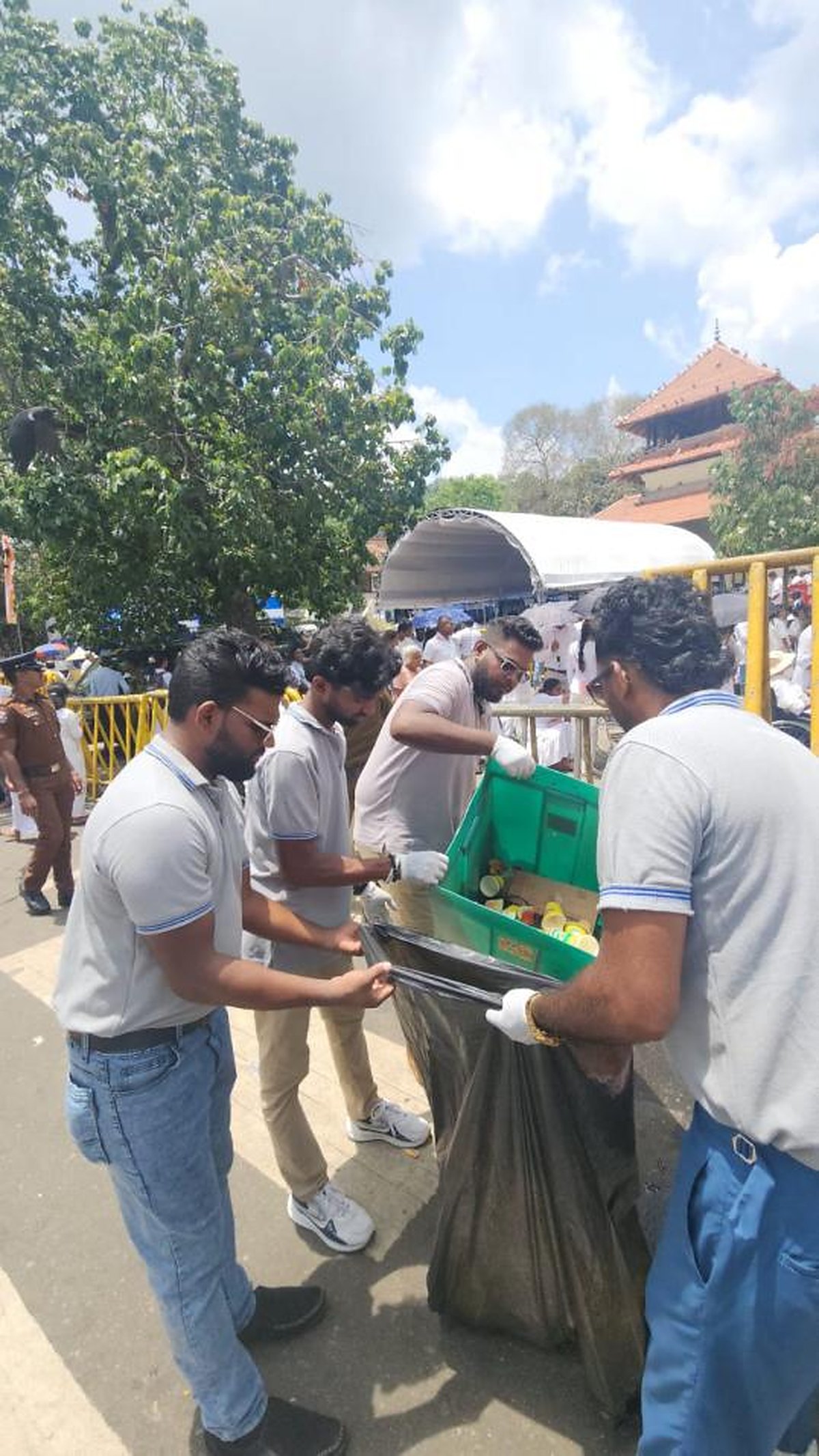 Phoenix team members collecting waste at the Exhibition of the Sacred Tooth Relic in Kandy