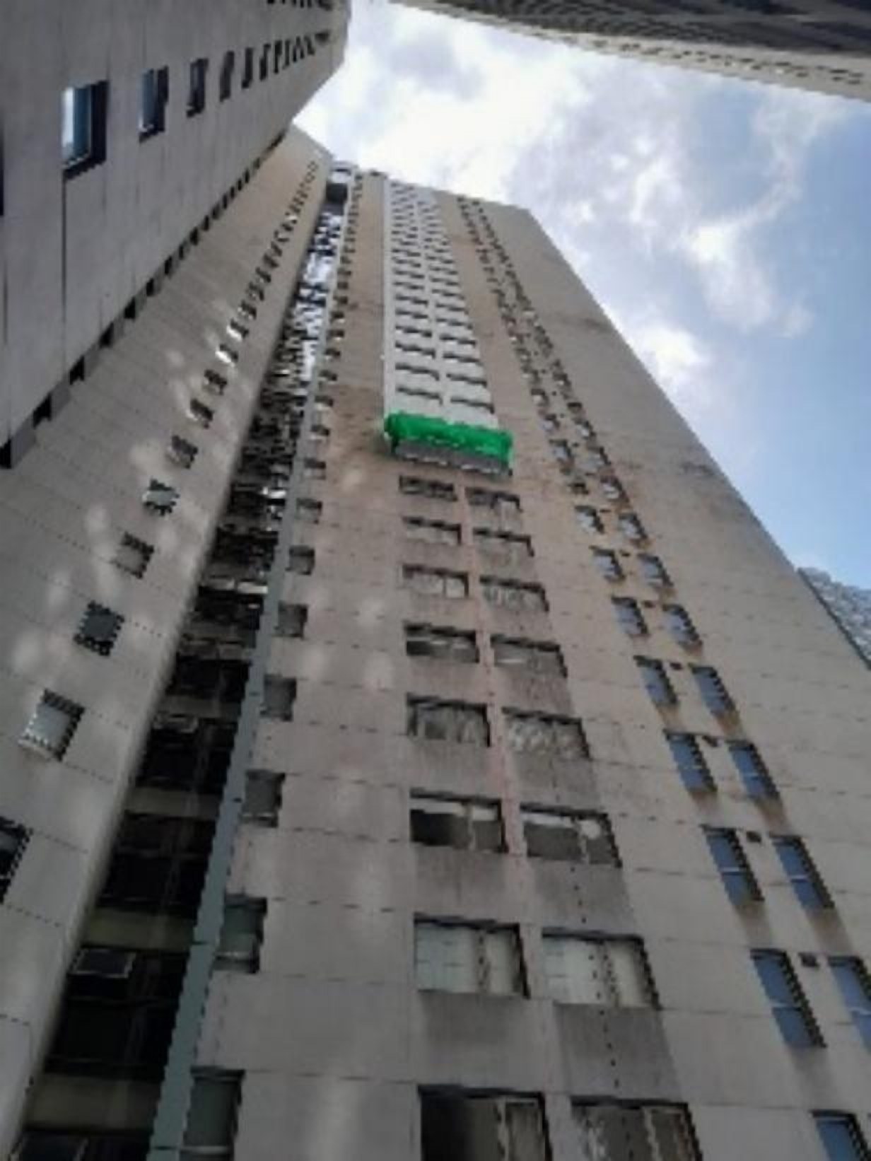 High-rise residential tower during facade works